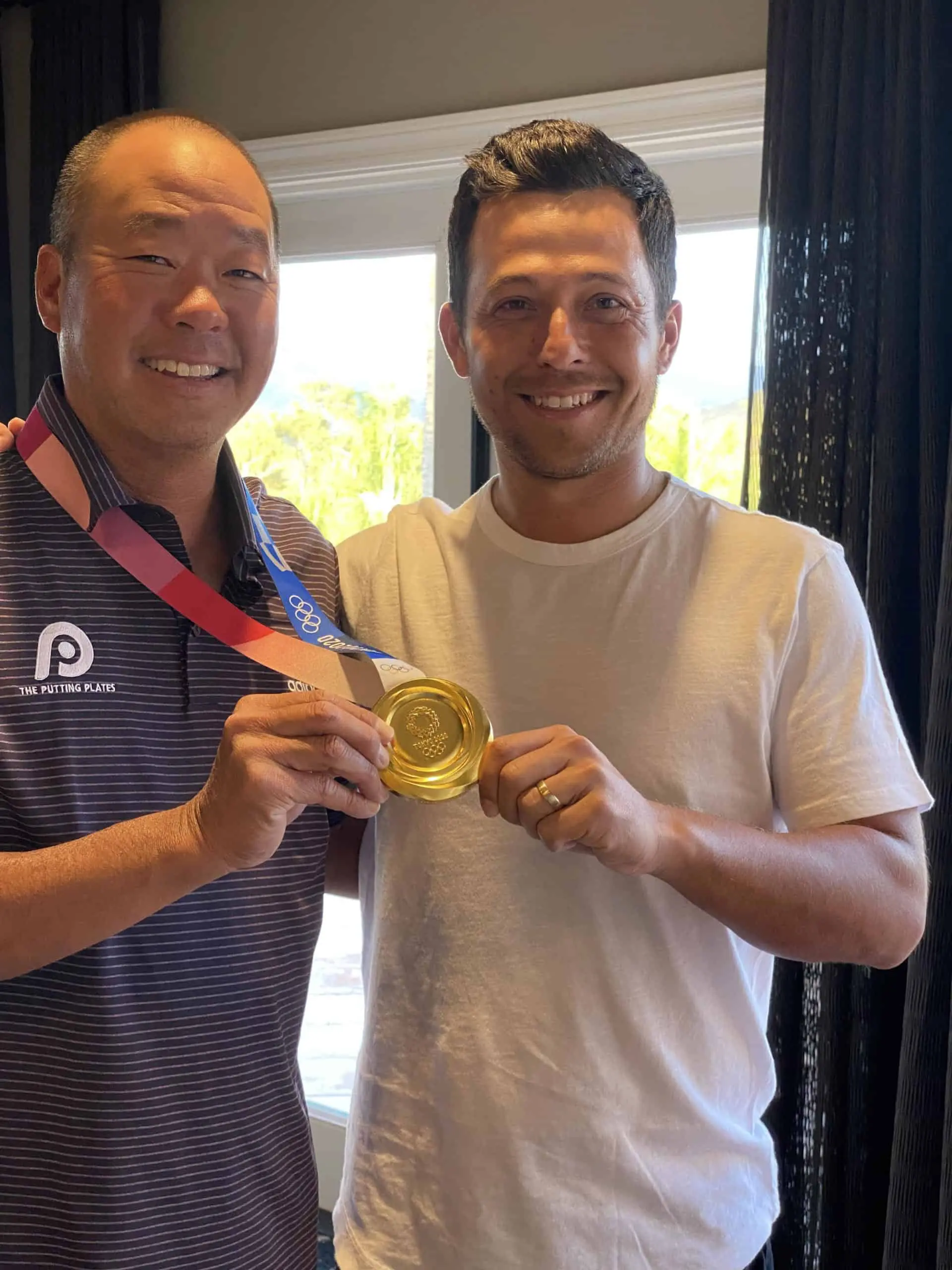 Derek Uyeda with Olympic Gold Medal